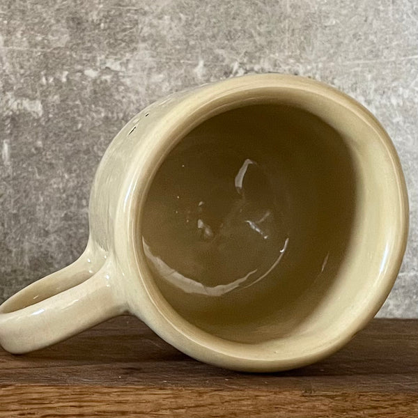 Ceramic mug with word POILSIS