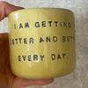 Yellow affirmation mug about healing and improving