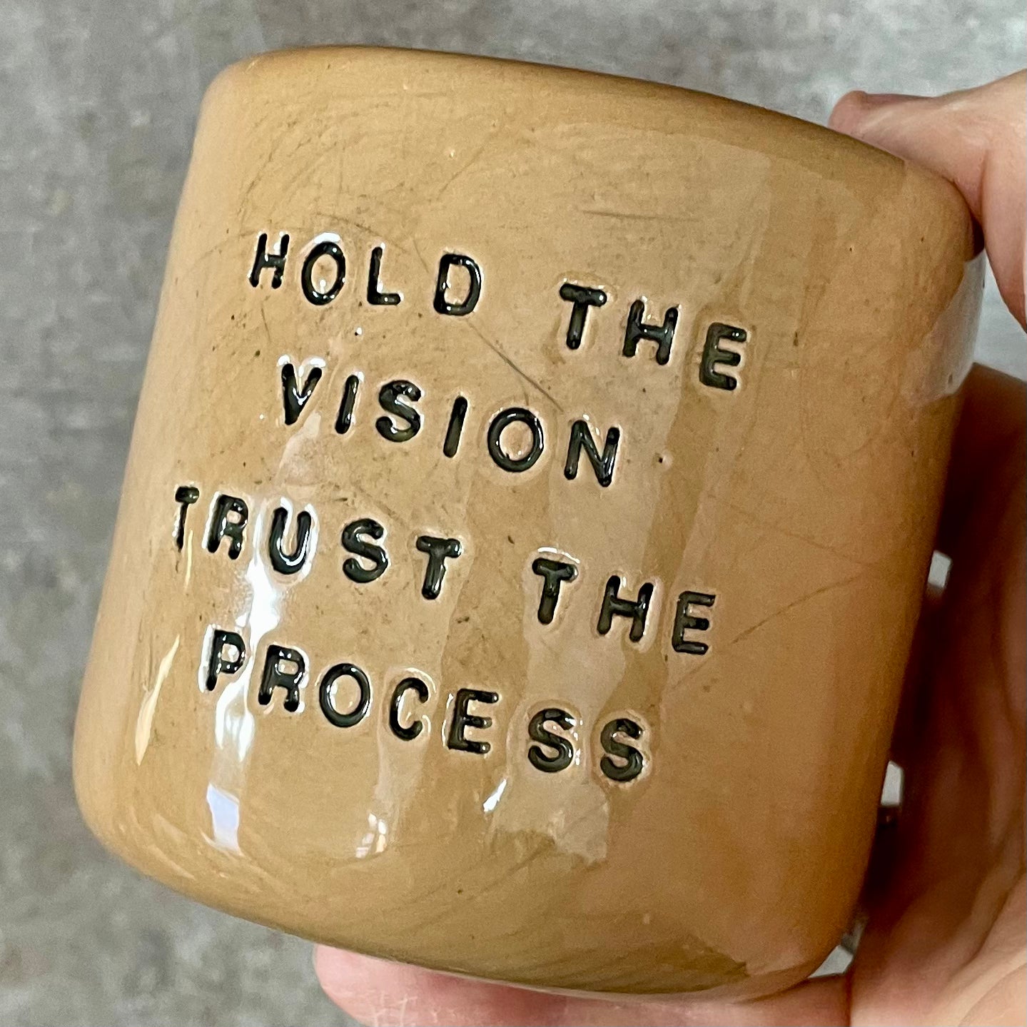 Brownish tumbler mug with inspirational words