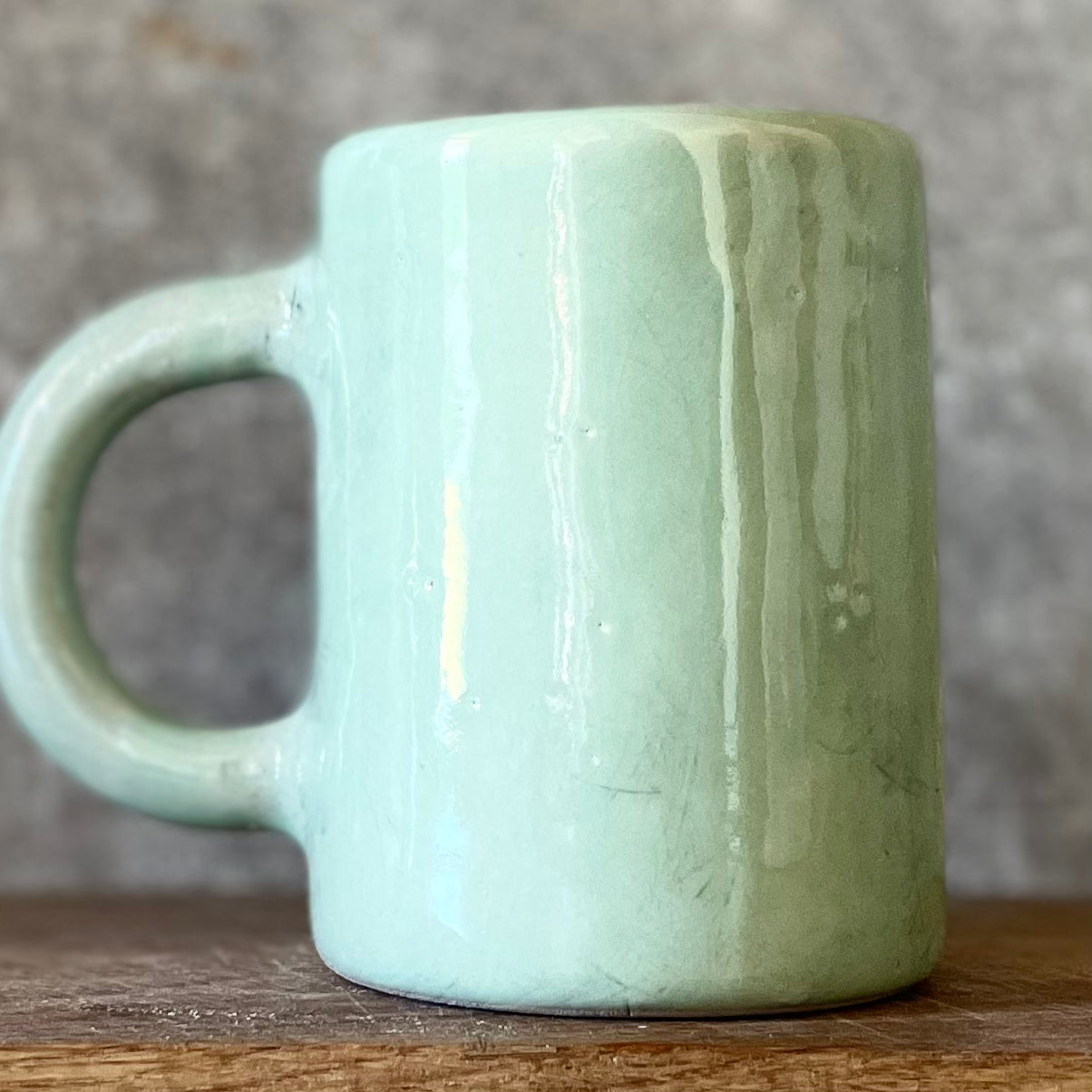 Ceramic mug with words in Lithuanian LABAS RYTAS, SAULYTE!