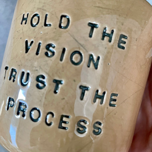 Brownish tumbler mug with inspirational words