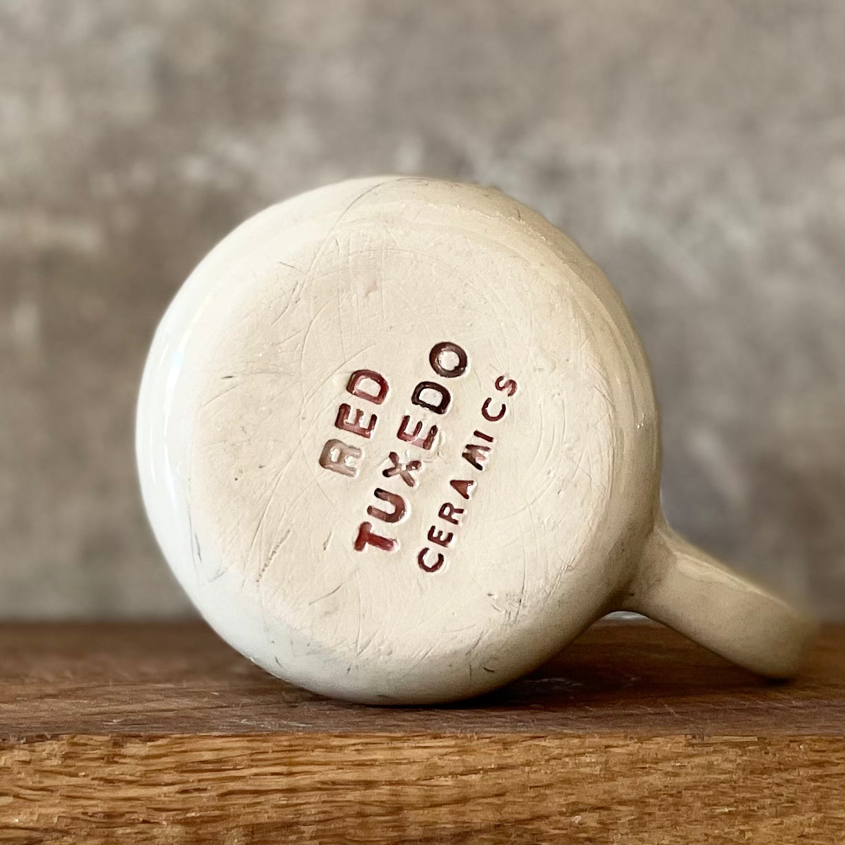 Ceramic coffee mug with writer quote