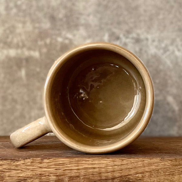 Brownish mug with sweet words in Lithuanian