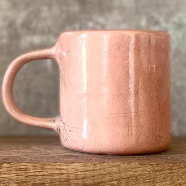 Pink mug with inspirational saying