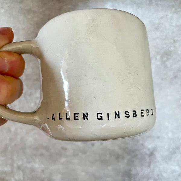 Ceramic coffee mug with writer quote