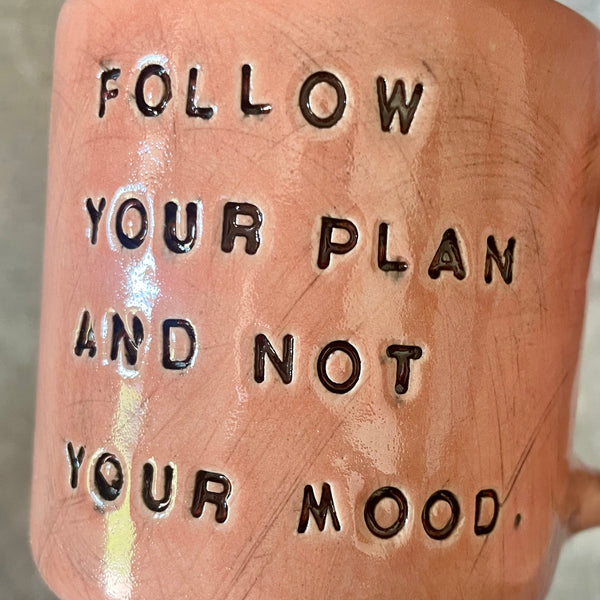 Pink mug with inspirational saying