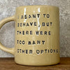 Yellowish coffee mug with funny saying