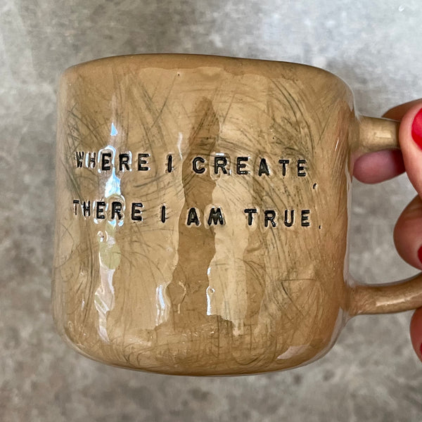 Ceramic mug with creativity quote