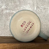 Pale blue coffee mug with inspirational saying