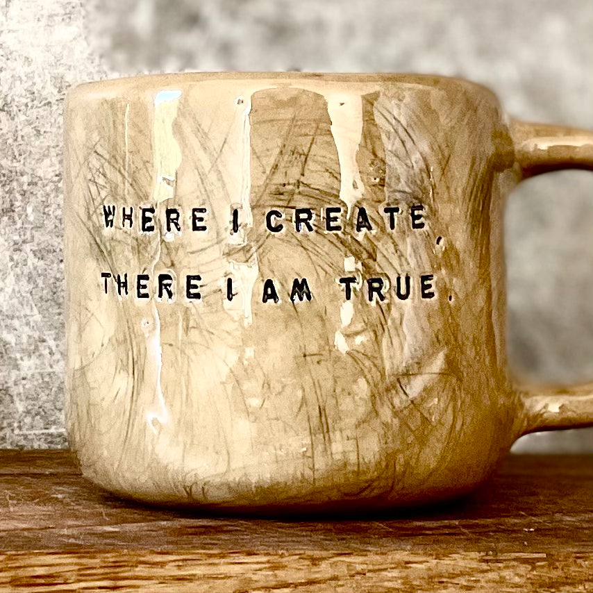 Ceramic mug with creativity quote