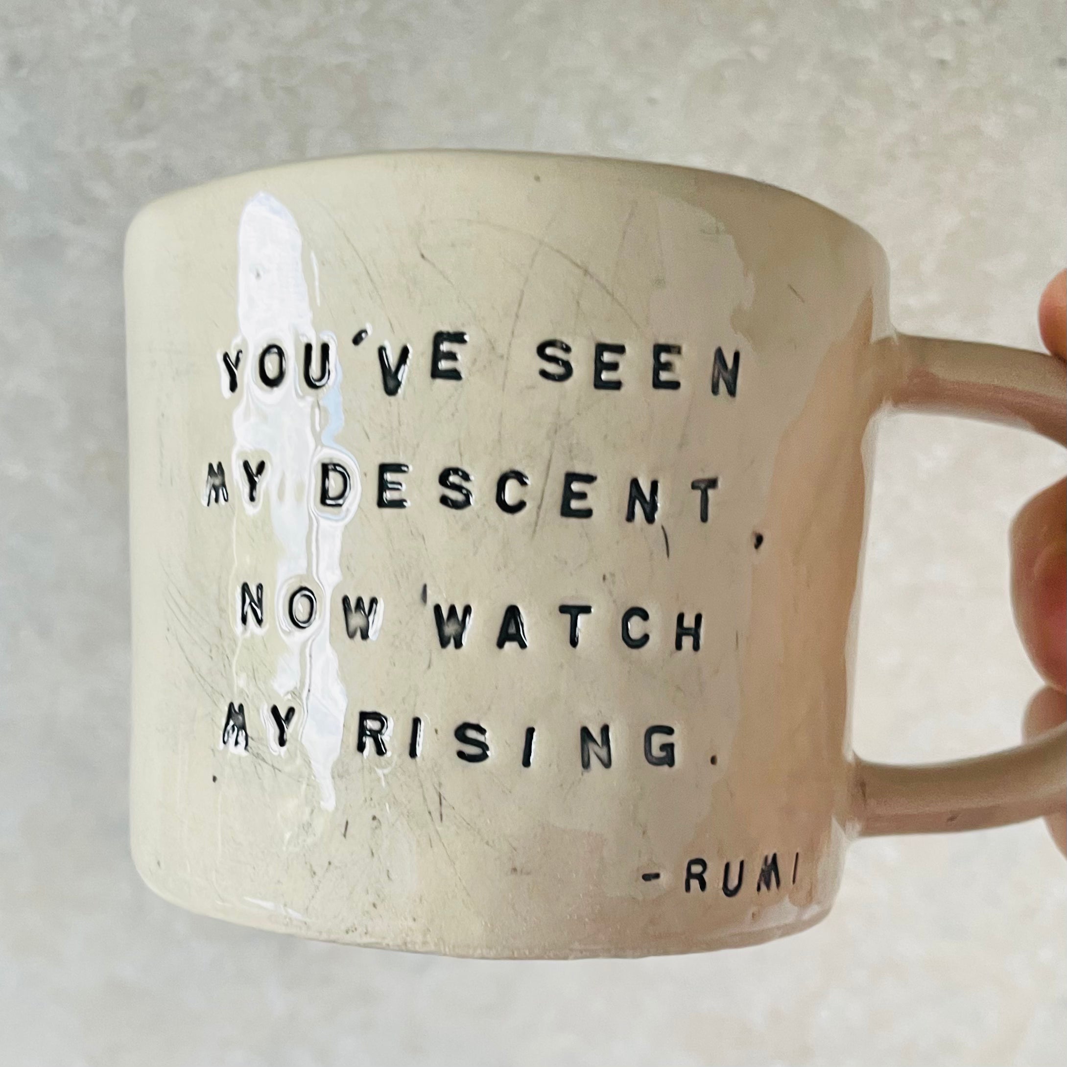 White ceramic mug with quote by Rumi