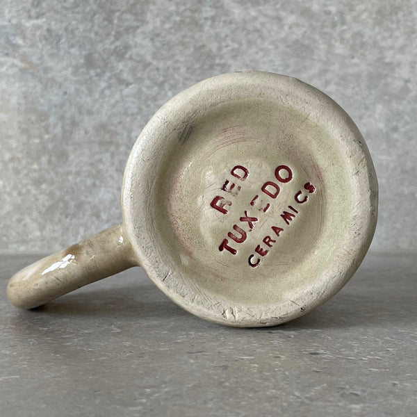 Ceramic mug with quote in Lithuanian