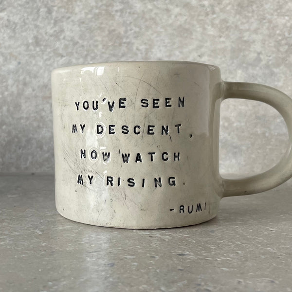 White ceramic mug with quote by Rumi