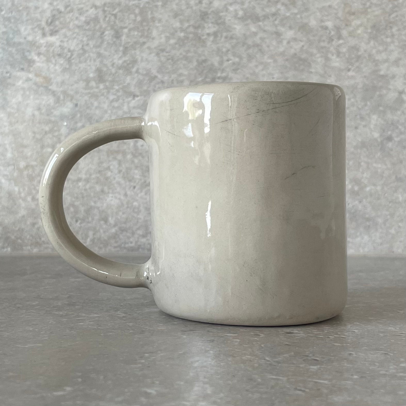 Ceramic mug with saying about coffee