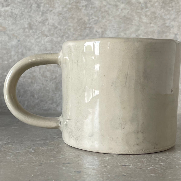 White ceramic mug with quote by Rumi