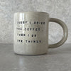 Ceramic mug with saying about coffee