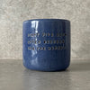 Blue ceramic mug with funny phrase