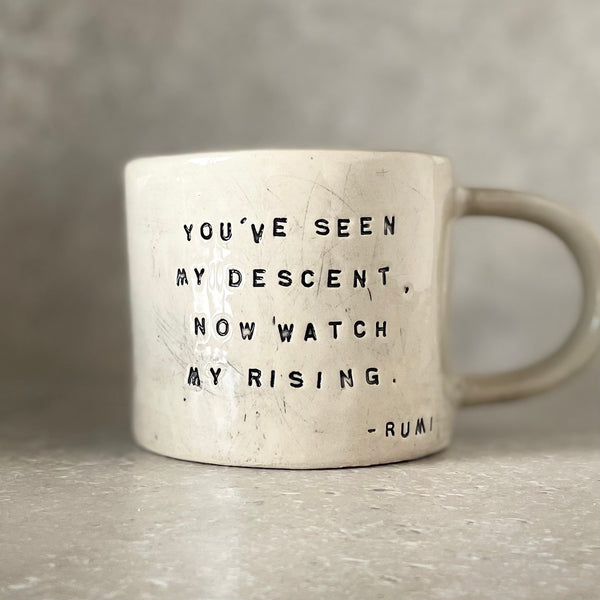 White ceramic mug with quote by Rumi