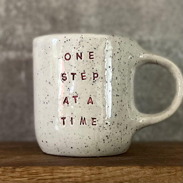 Off-white mug ONE STEP AT A TIME