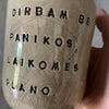 Beige tumbler mug with saying about work