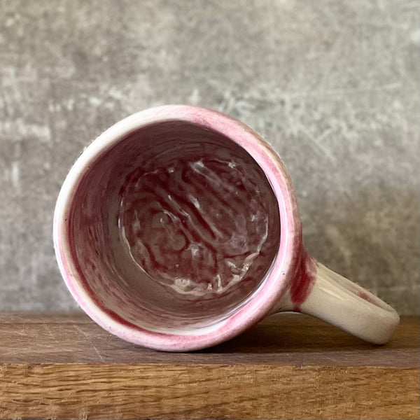 Light-berry-pink mug with words in Lithuanian
