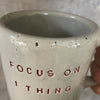 Off-white mug FOCUS