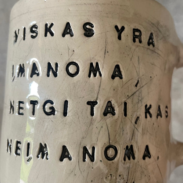 Baltas puodelis su citata