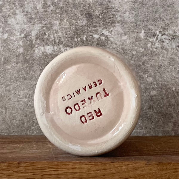 Rožinis puodelis su užrašu PRISIMINK, KODĖL PRADĖJAI