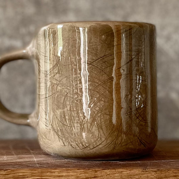 Dark brown tumbler mug with words about work