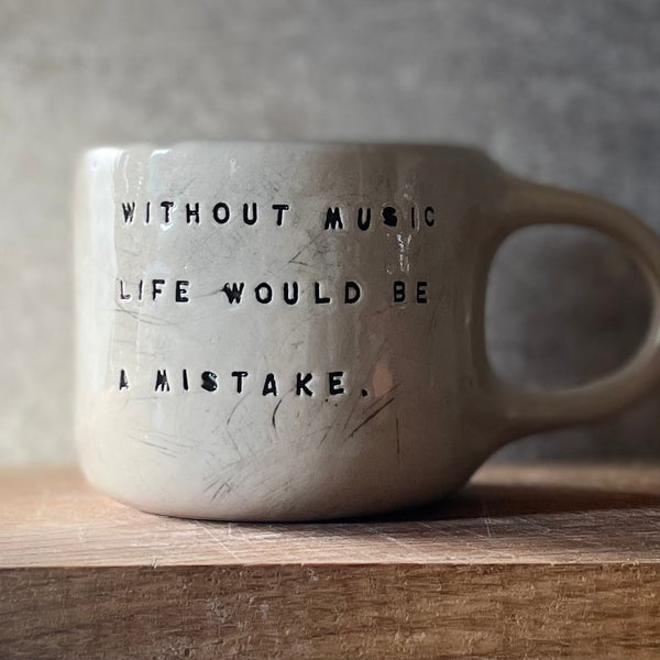 Mug with quote about music