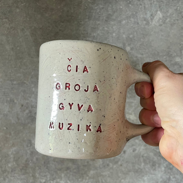 Speckled gray mug about music