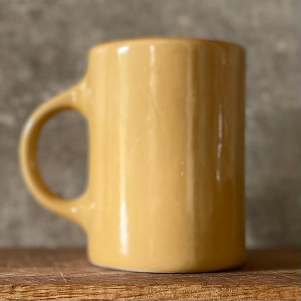 Yellow mug about work week