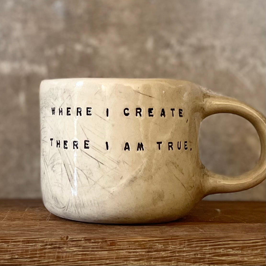 Ceramic mug with artist quote