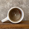 Pale mug with words of gratitude
