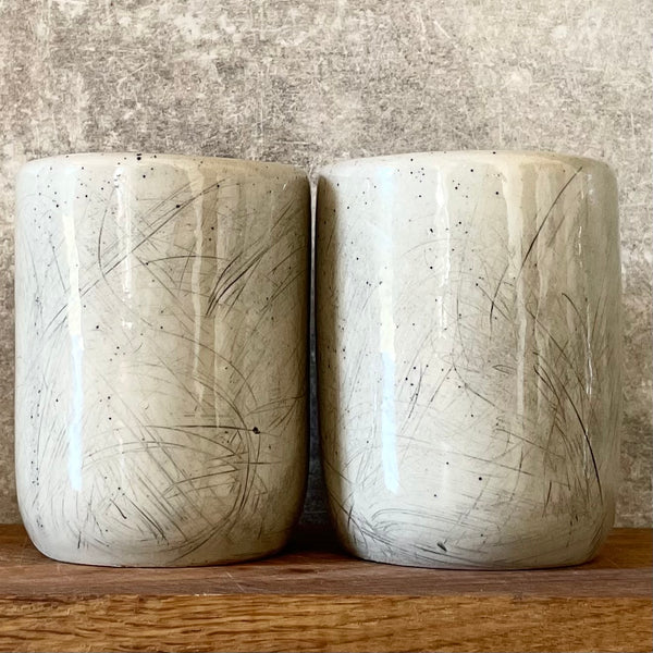 Two big ceramic tumbler mugs without handle about work