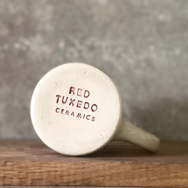 Smaller mug with funny phrase in Lithuanian