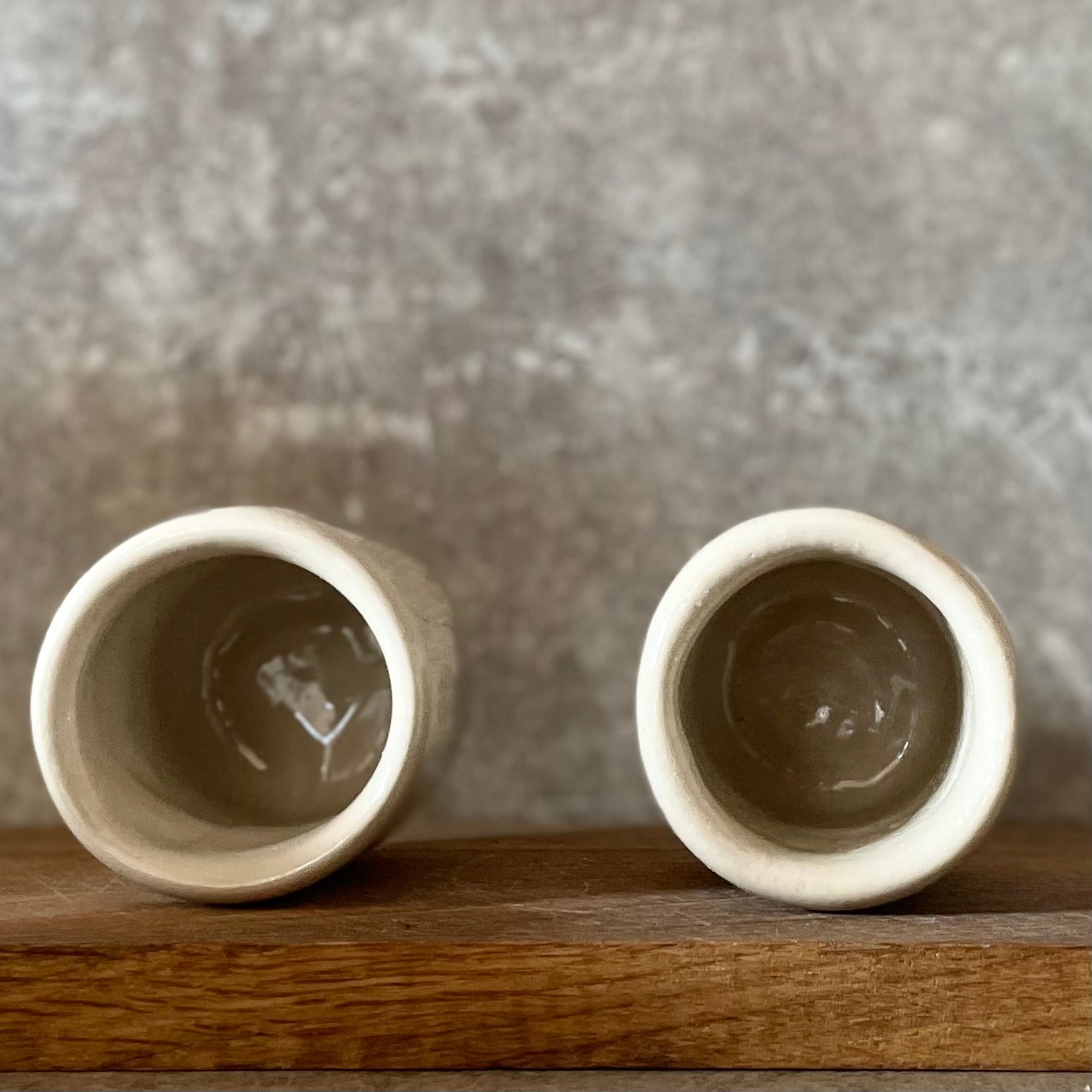 Set of two small mugs with words in Lithuanian