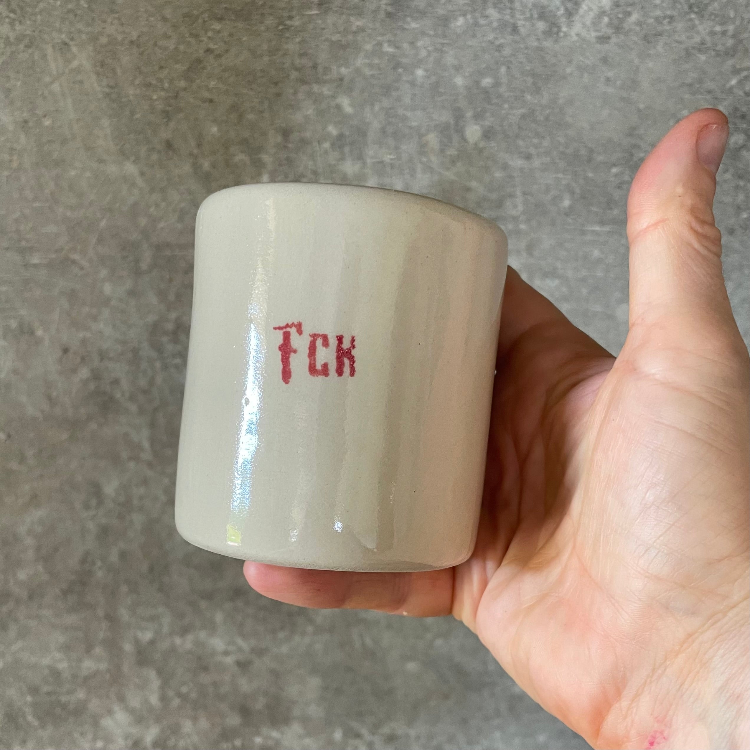 Two small bad mood mugs