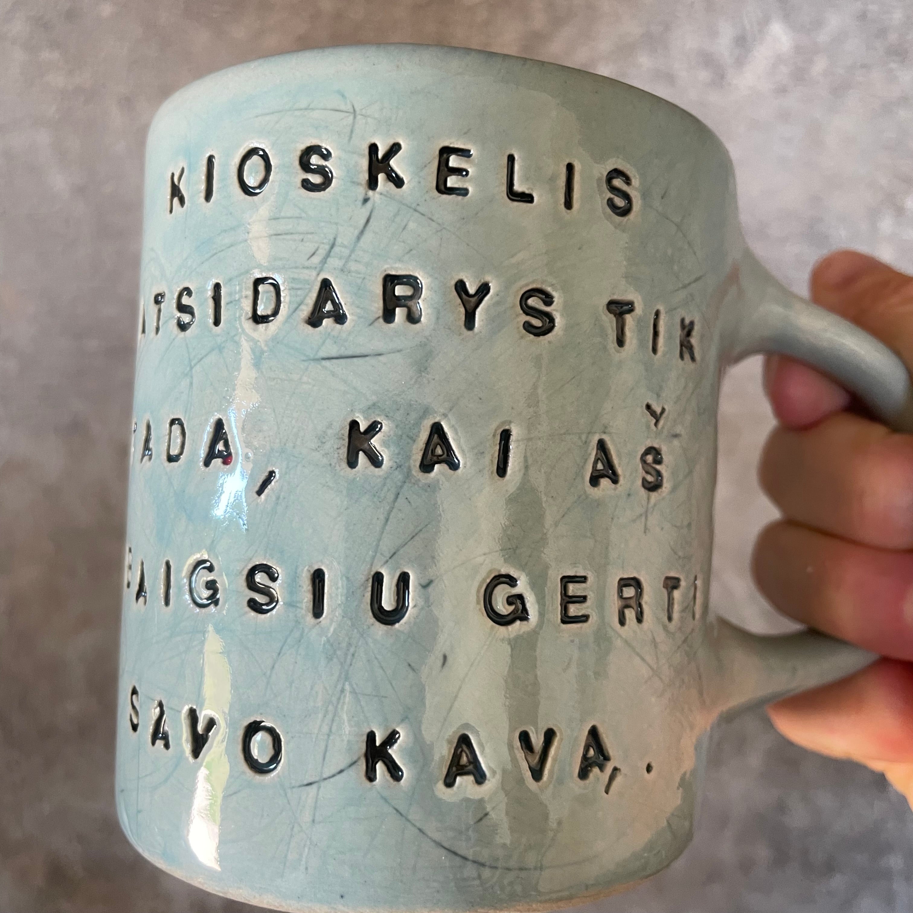 Blue mug with funny phrase in Lithuanian