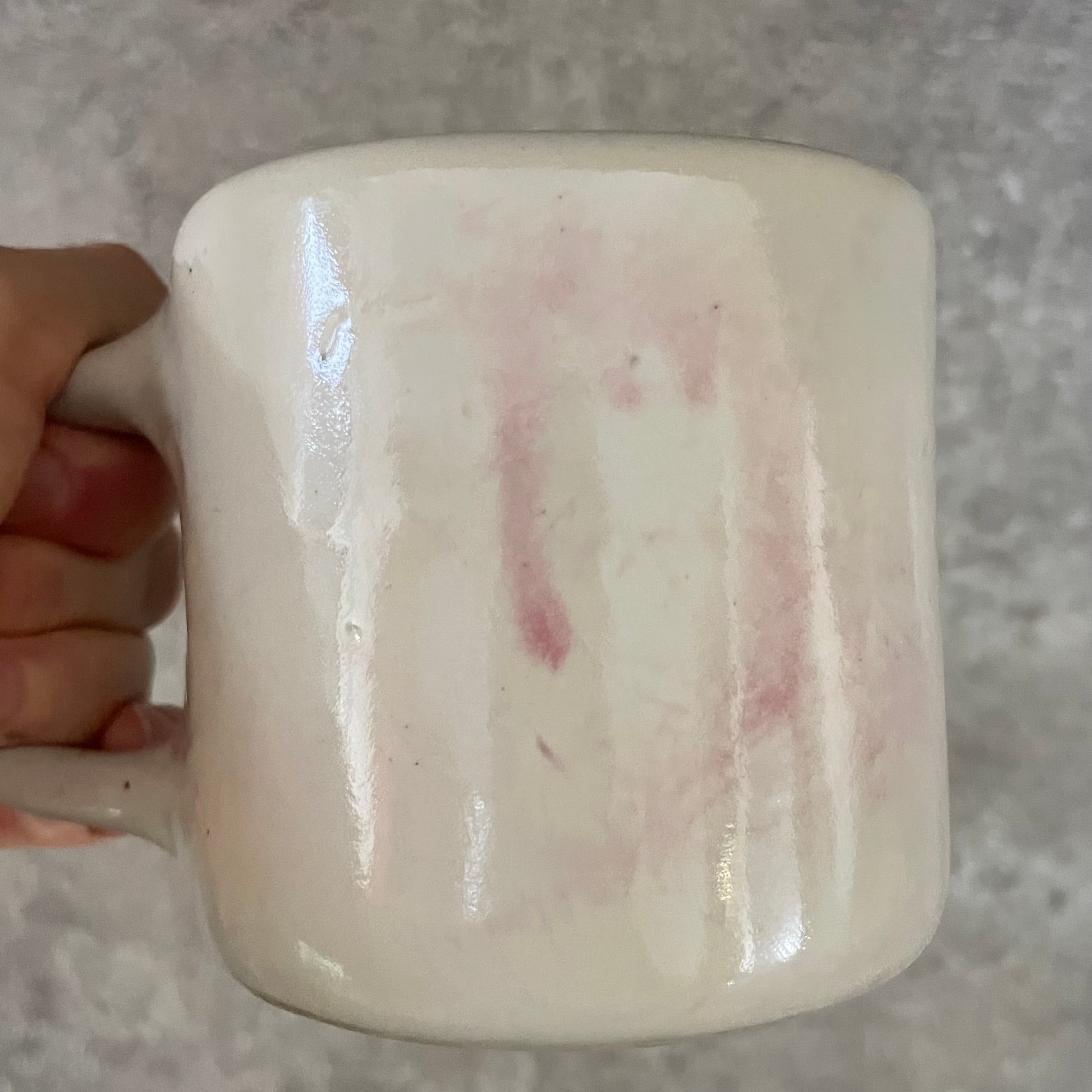 Pale pink ceramic mug with word LĖTAI