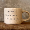 Puodelis su užrašu apie Prosecco