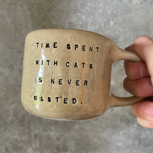 Mug with quote about cats