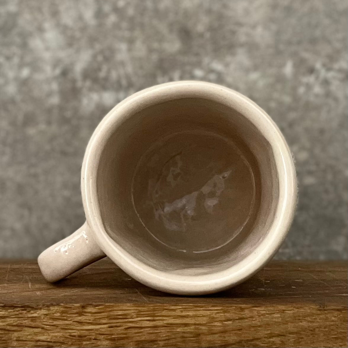 Pale pink mug with prosecco saying