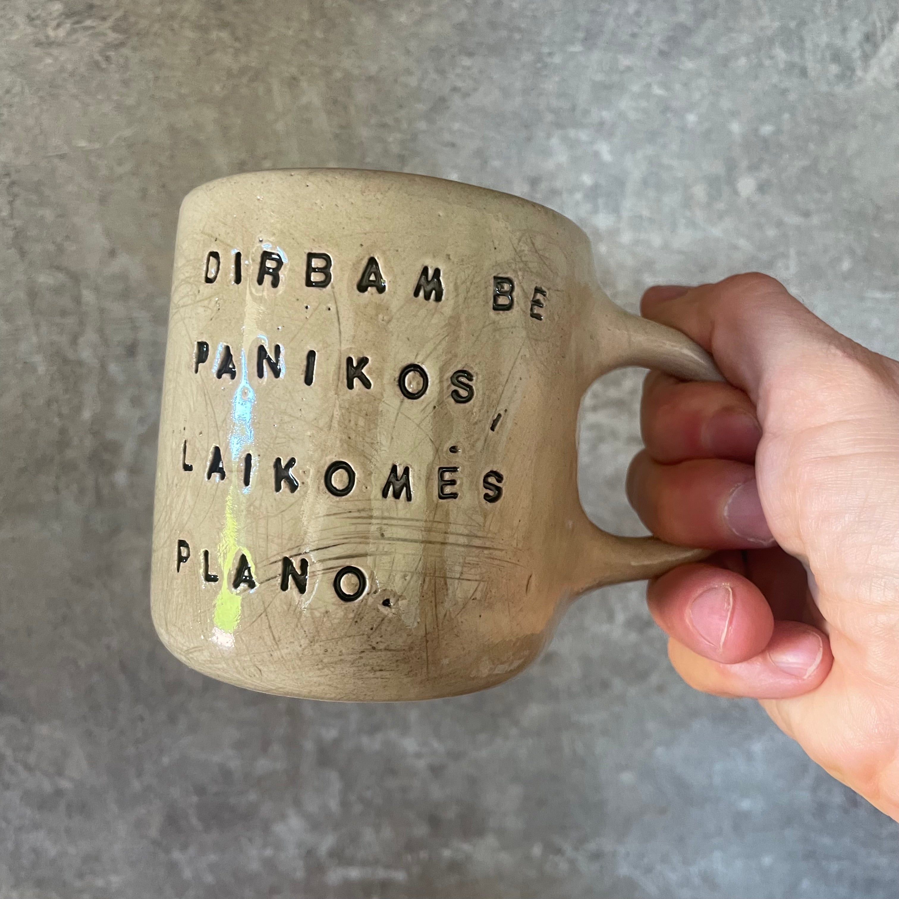 Ceramic mug with words about work