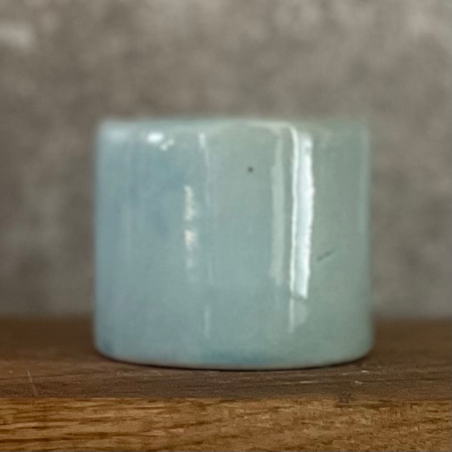 Mažas melsvas puodelis apie atostogas