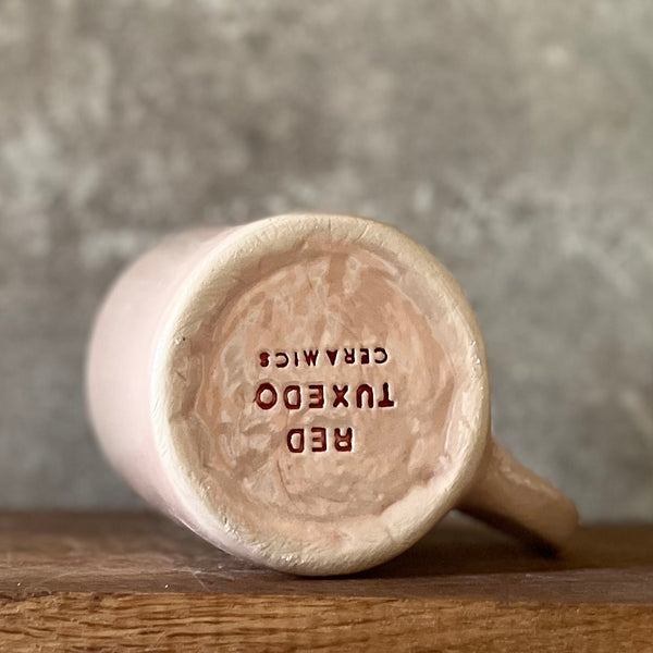 Puodelis su užrašu apie Prosecco