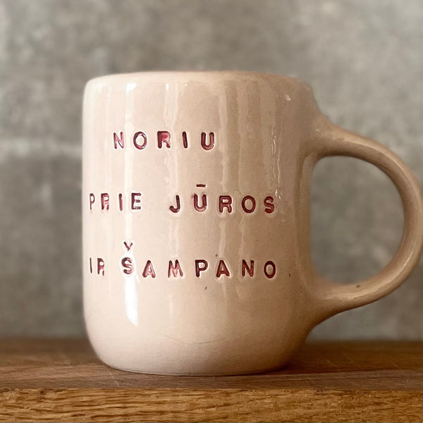 Rausvas puodelis ŠAMPANO