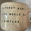 Mug with quote about music