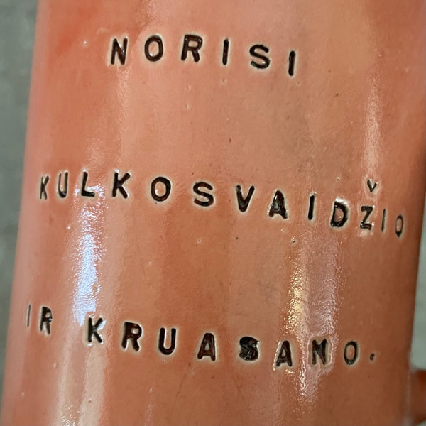 Pink mug with funny phrase in Lithuanian