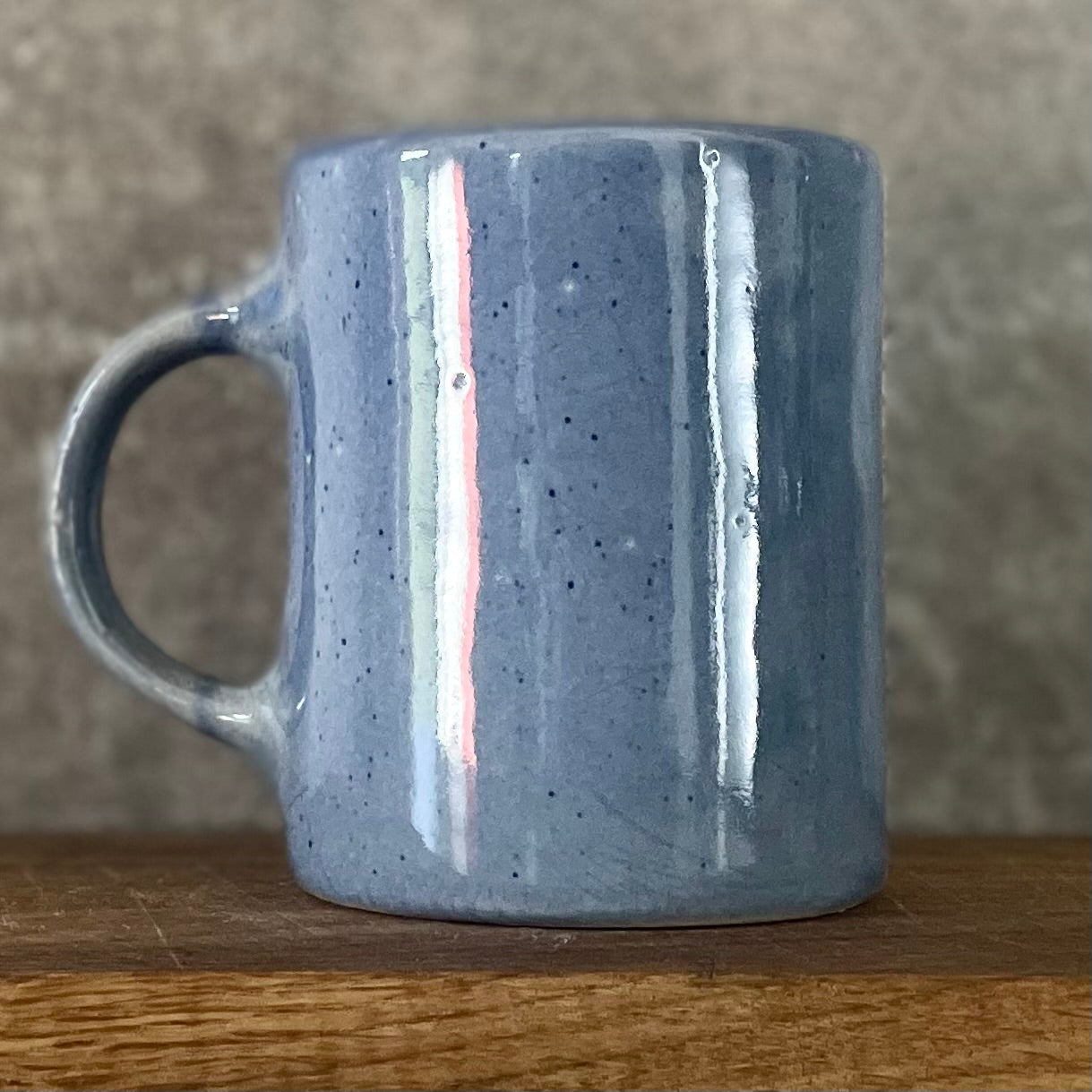 Handmade blue ceramic mug with funny text